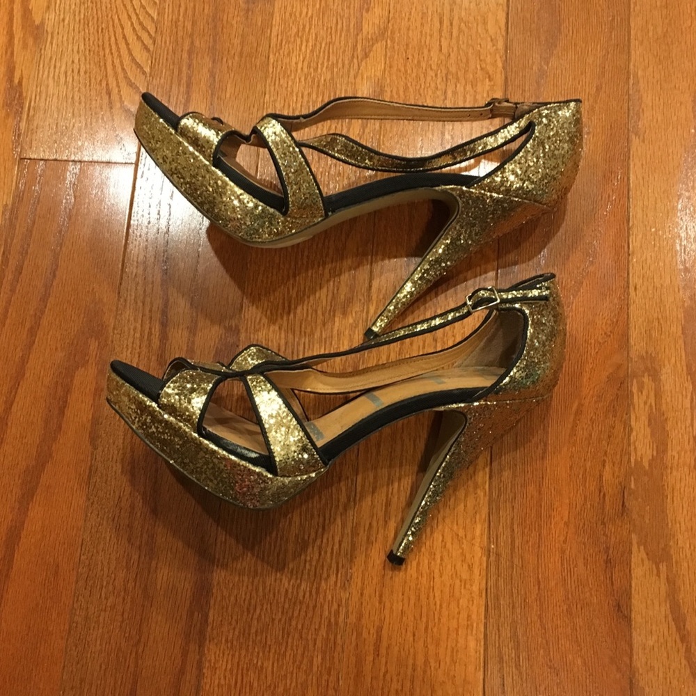 Elle golden heels